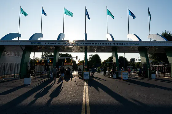 Fairgoers walking in through the gate on opening morning